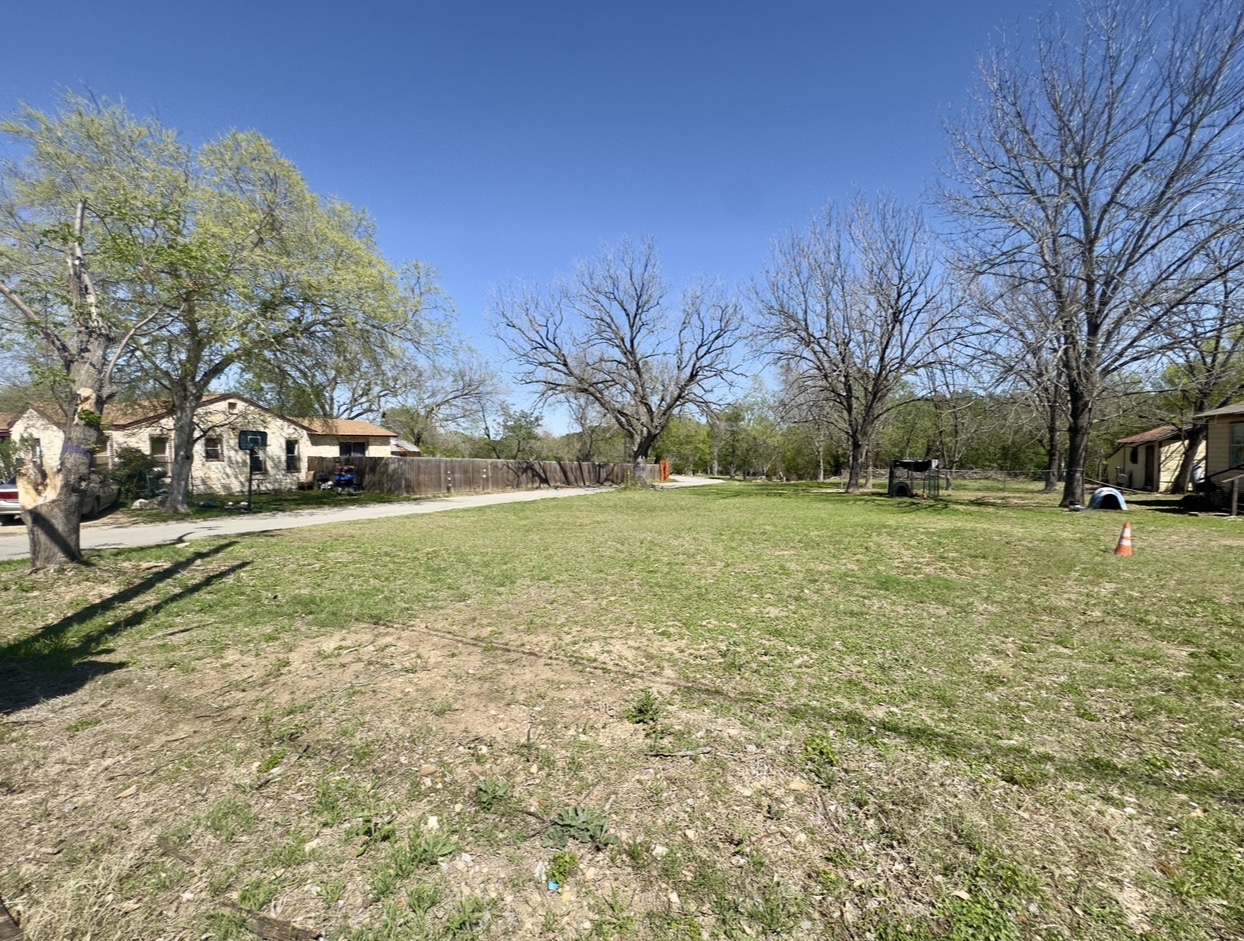 600 Sabine Street Lockhart, TX 78644 - Photo 7 of 19 a view of a yard with houses