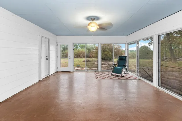 a view of a room with a large window