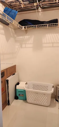 a view of a big yard with a large tree