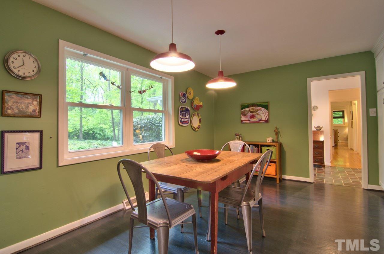 3105 Buckingham Road Durham, NC 27707 - Photo 11 of 25 a view of a dining room with furniture window and wooden floor