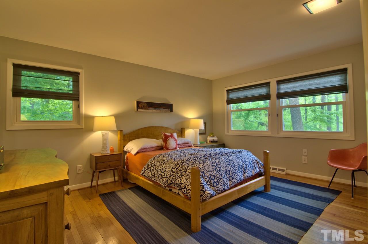 3105 Buckingham Road Durham, NC 27707 - Photo 15 of 25 a bedroom with a bed and a window