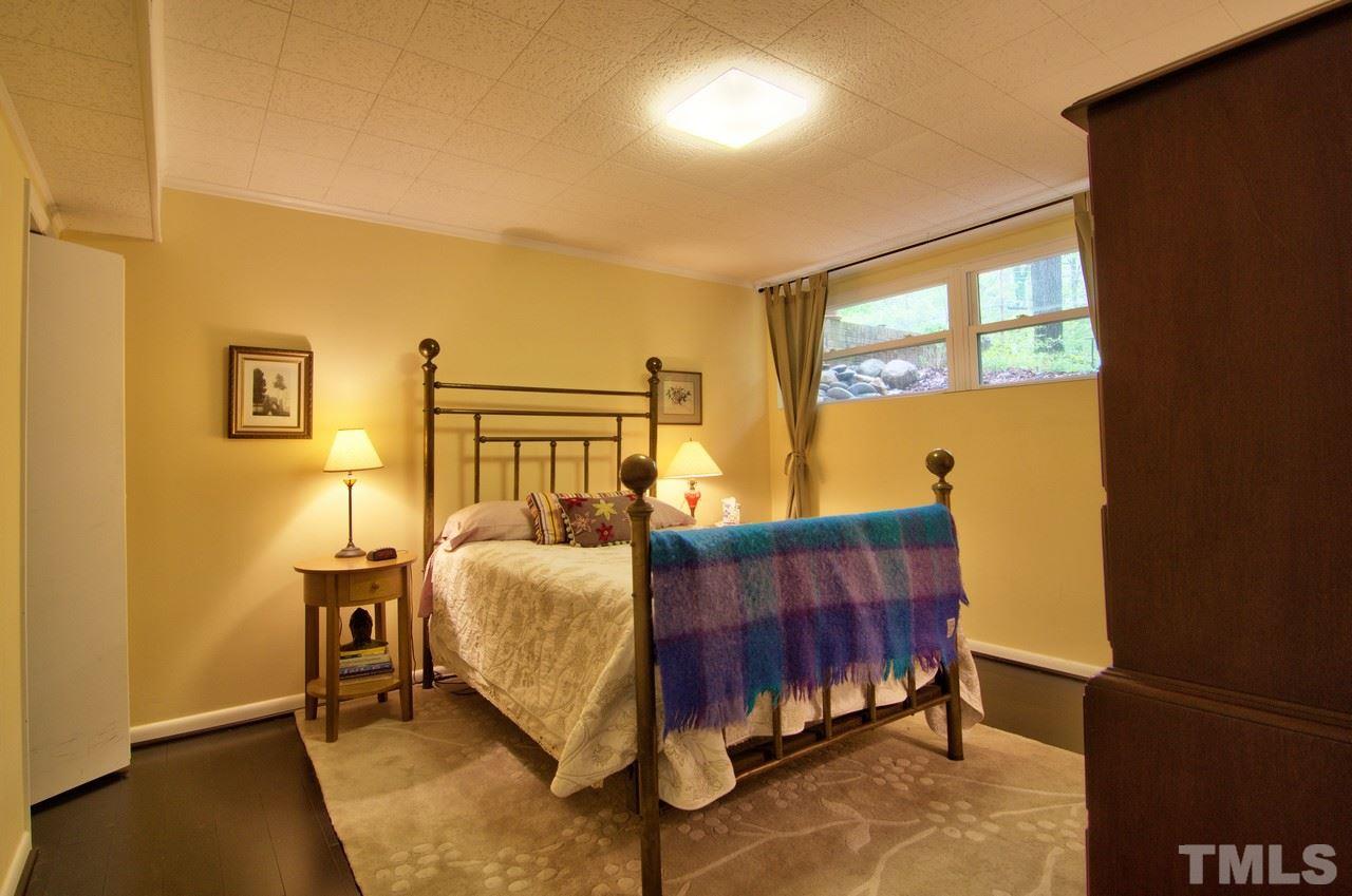 3105 Buckingham Road Durham, NC 27707 - Photo 19 of 25 a bedroom with a bed and window