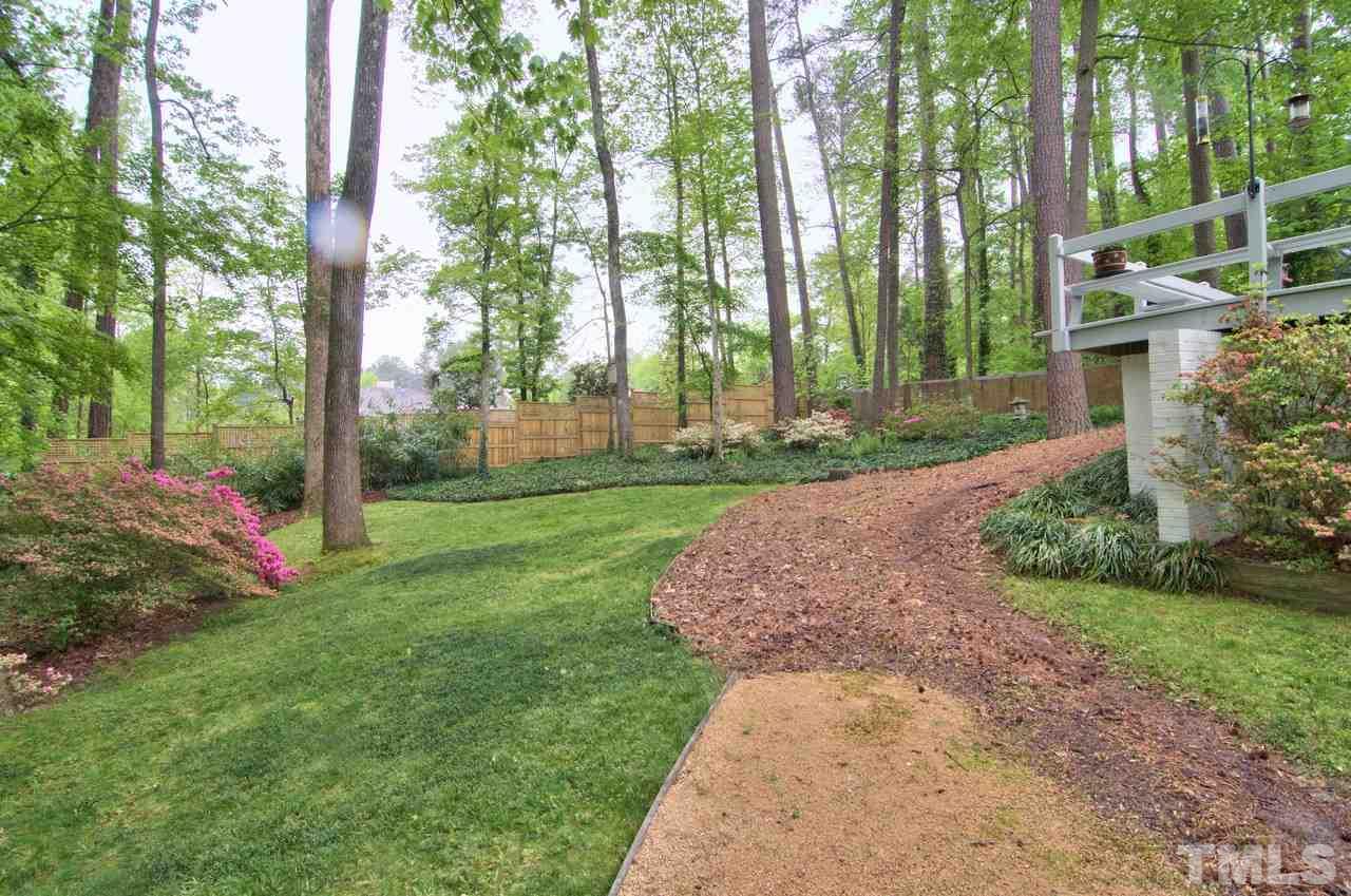 3105 Buckingham Road Durham, NC 27707 - Photo 25 of 25 a view of a garden with large trees