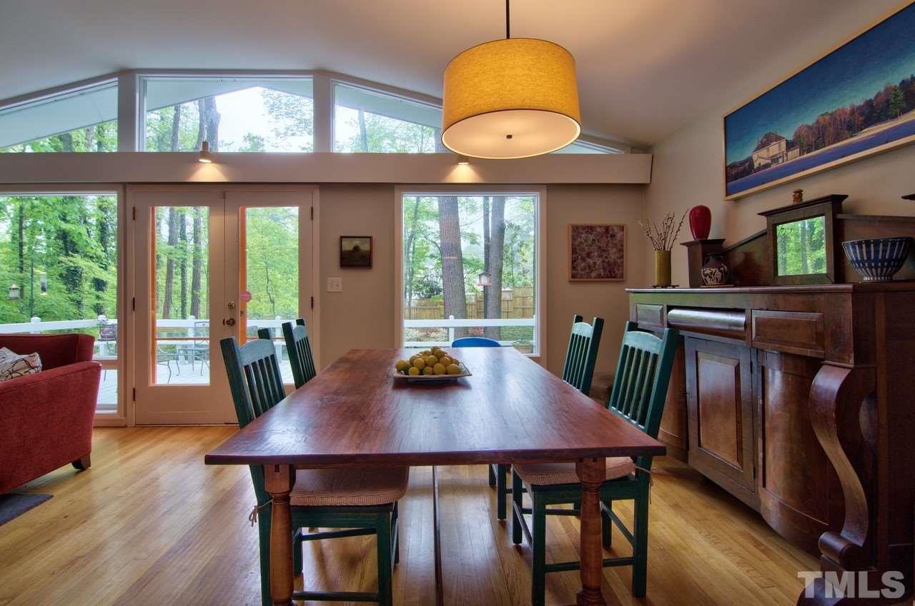 3105 Buckingham Road Durham, NC 27707 - Photo 7 of 25 a view of a dining room with furniture window and wooden floor