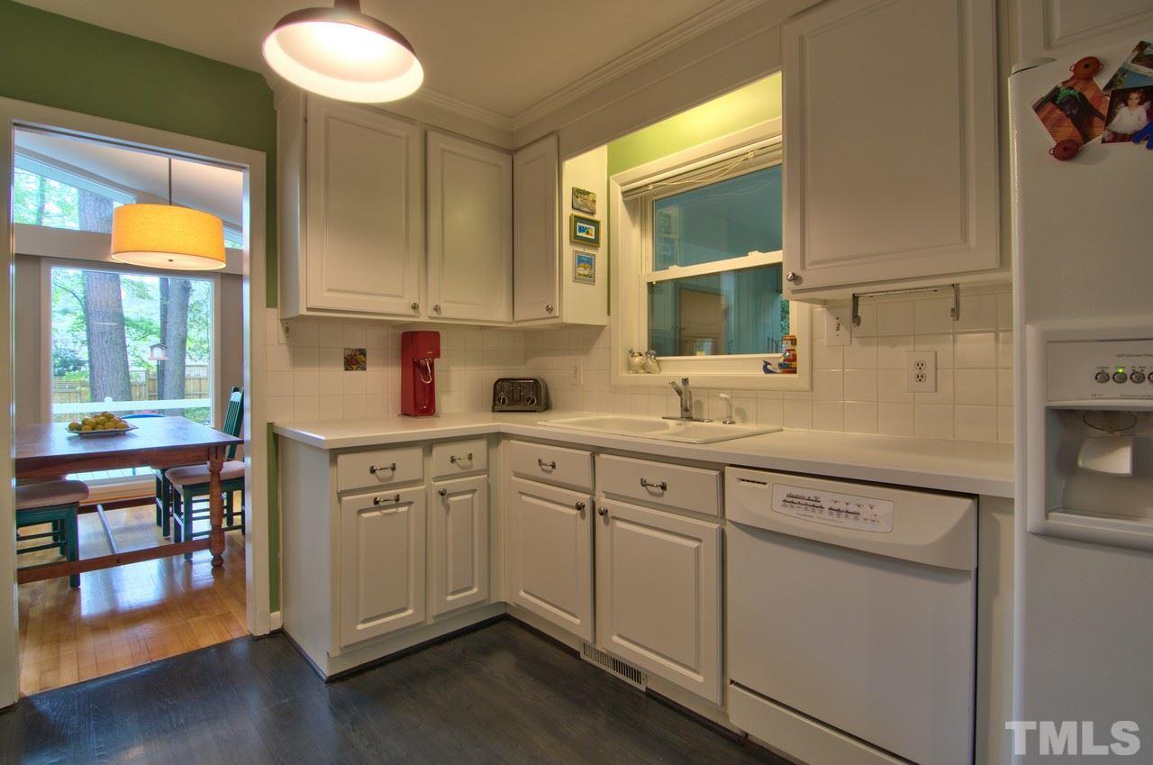 3105 Buckingham Road Durham, NC 27707 - Photo 9 of 25 a kitchen with cabinets and window