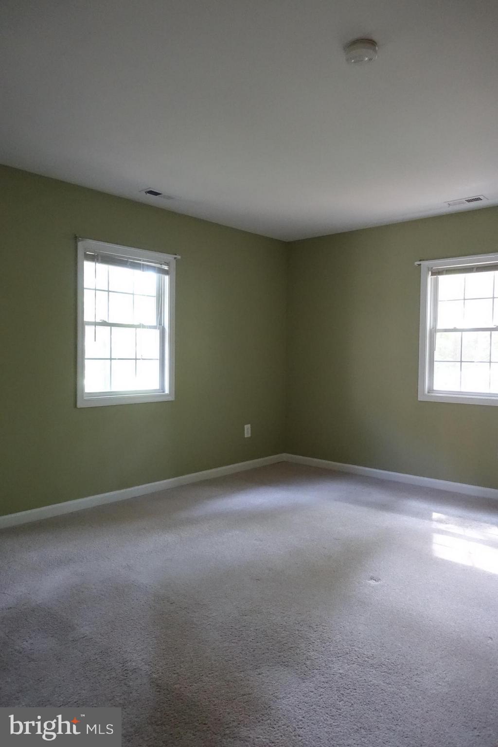 702 Old Love Point Road Stevensville, MD 21666 - Photo 17 of 41 Master bedroom with 2 windows, private full bath