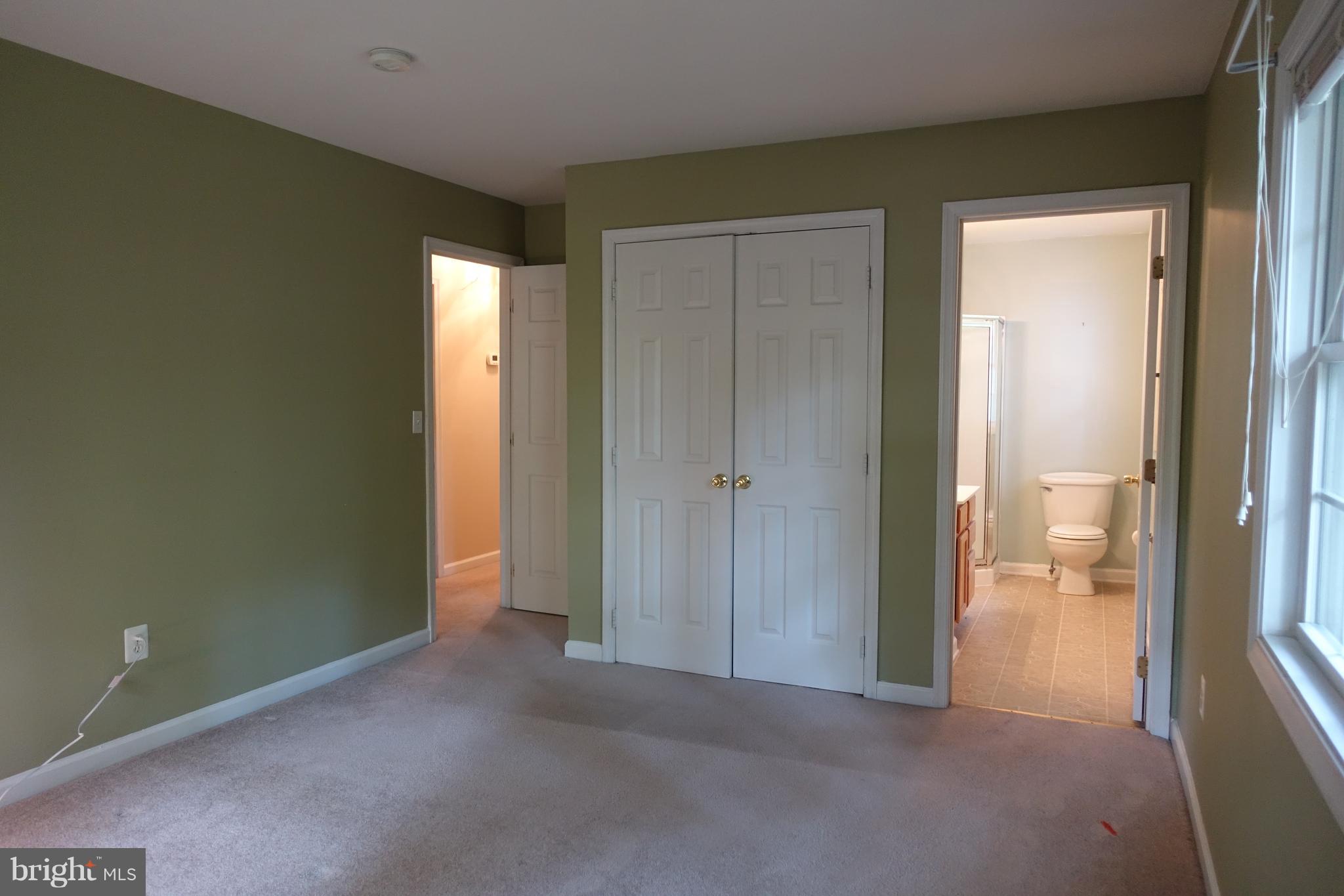 702 Old Love Point Road Stevensville, MD 21666 - Photo 20 of 41 Master bedroom with private bathroom