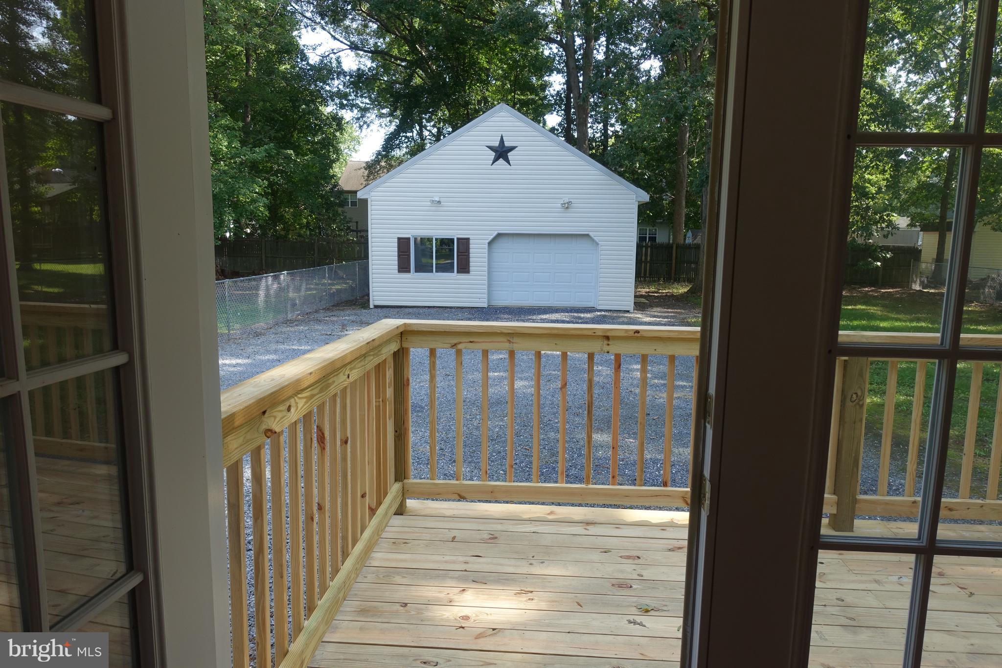 702 Old Love Point Road Stevensville, MD 21666 - Photo 25 of 41 French doors open to new deck