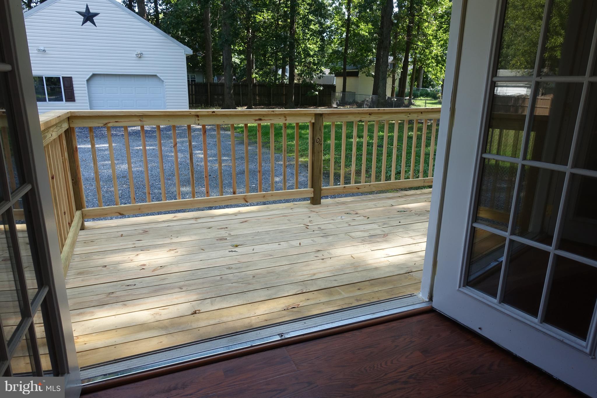 702 Old Love Point Road Stevensville, MD 21666 - Photo 26 of 41 French doors open to new deck