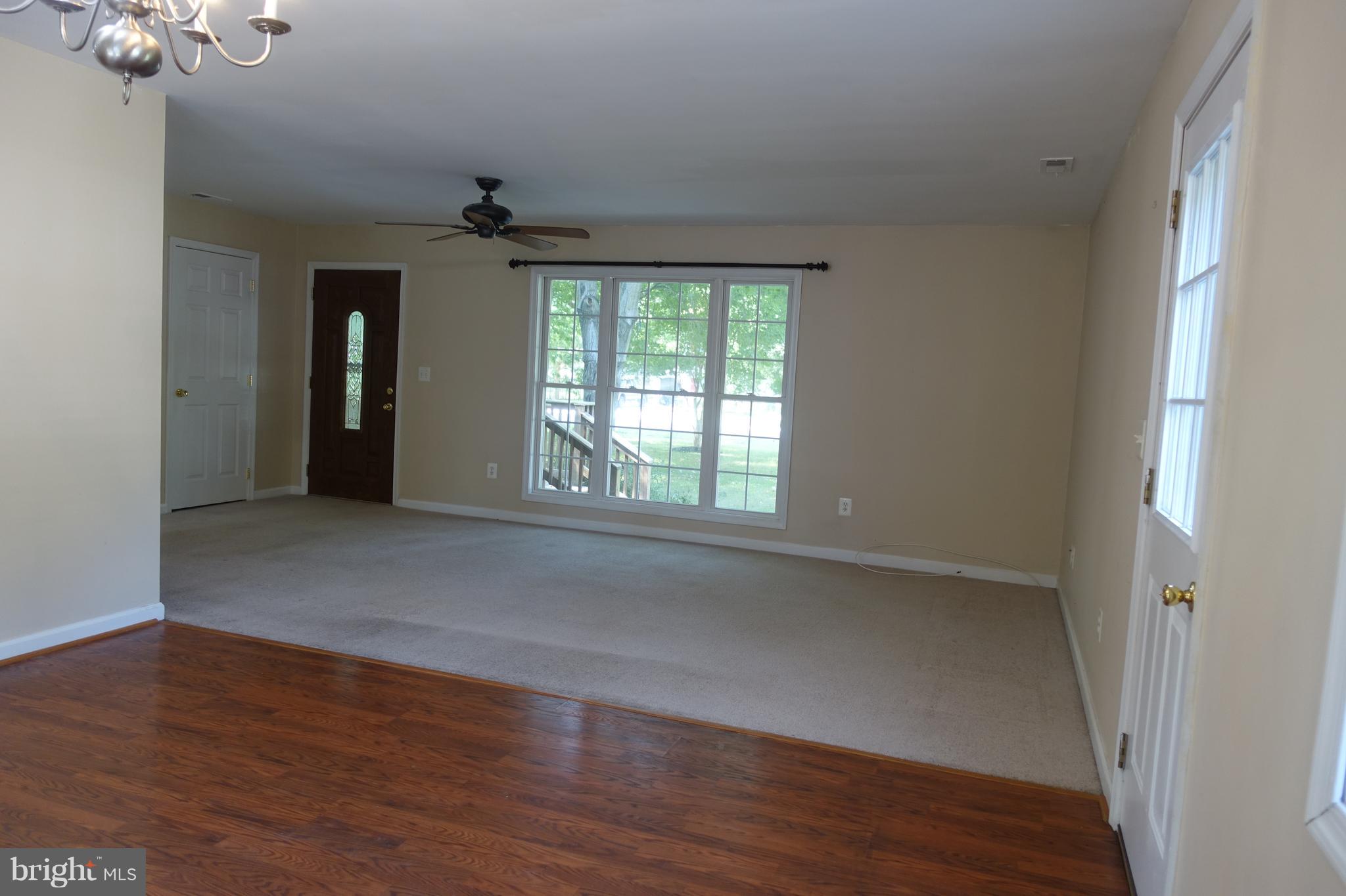 702 Old Love Point Road Stevensville, MD 21666 - Photo 29 of 41 Family room, dining room
