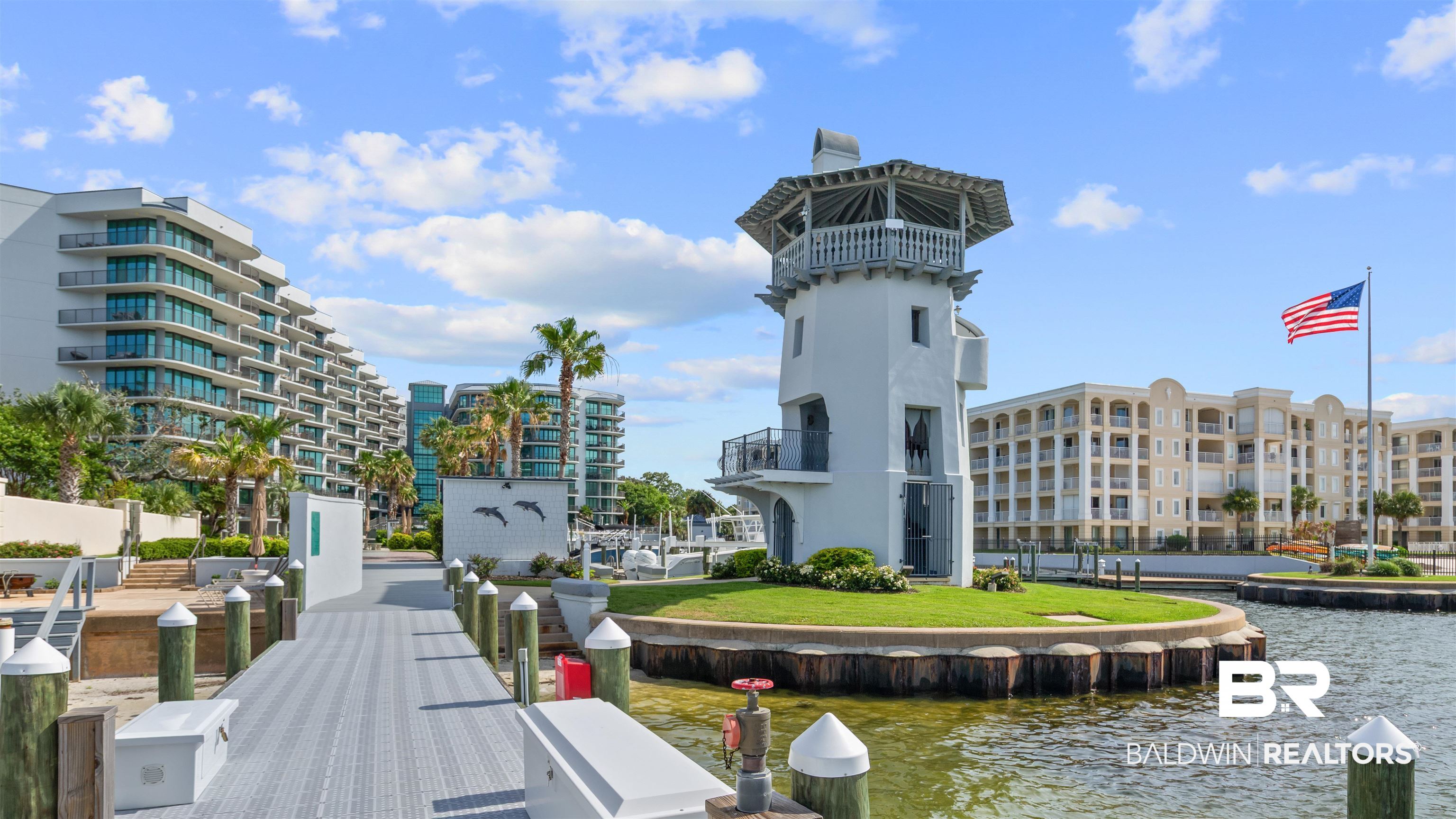 27582 Canal Road, Unit 2207 Orange Beach, AL 36561 - Photo 21 of 25 Dock featuring a water view