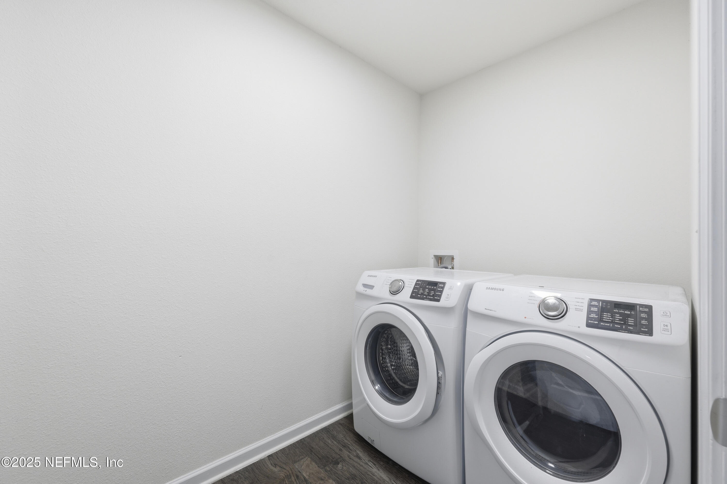 4298 Warm Springs Way Middleburg, FL 32068 - Photo 27 of 36 a utility room with dryer and washer