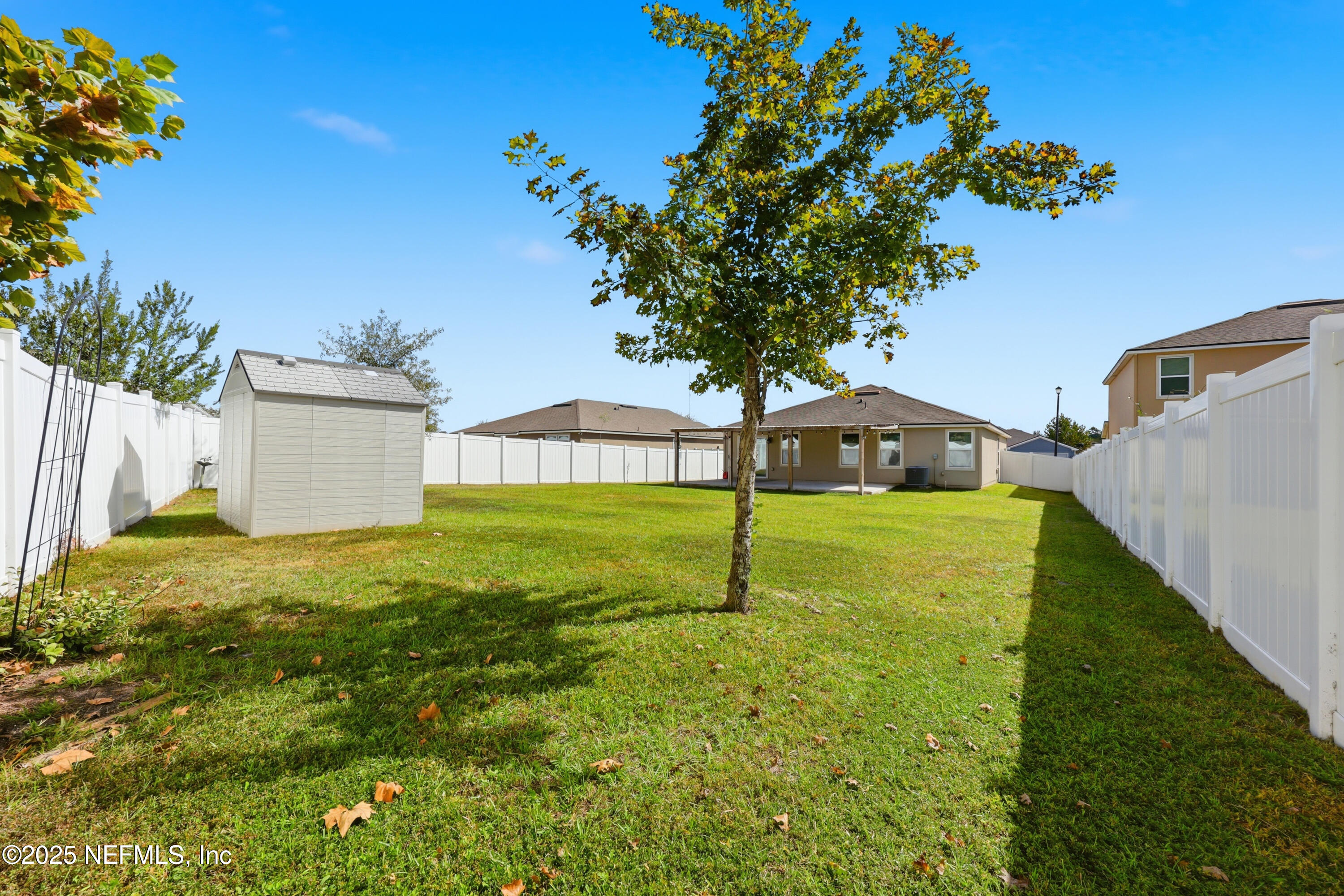 4298 Warm Springs Way Middleburg, FL 32068 - Photo 30 of 36 a house with green field