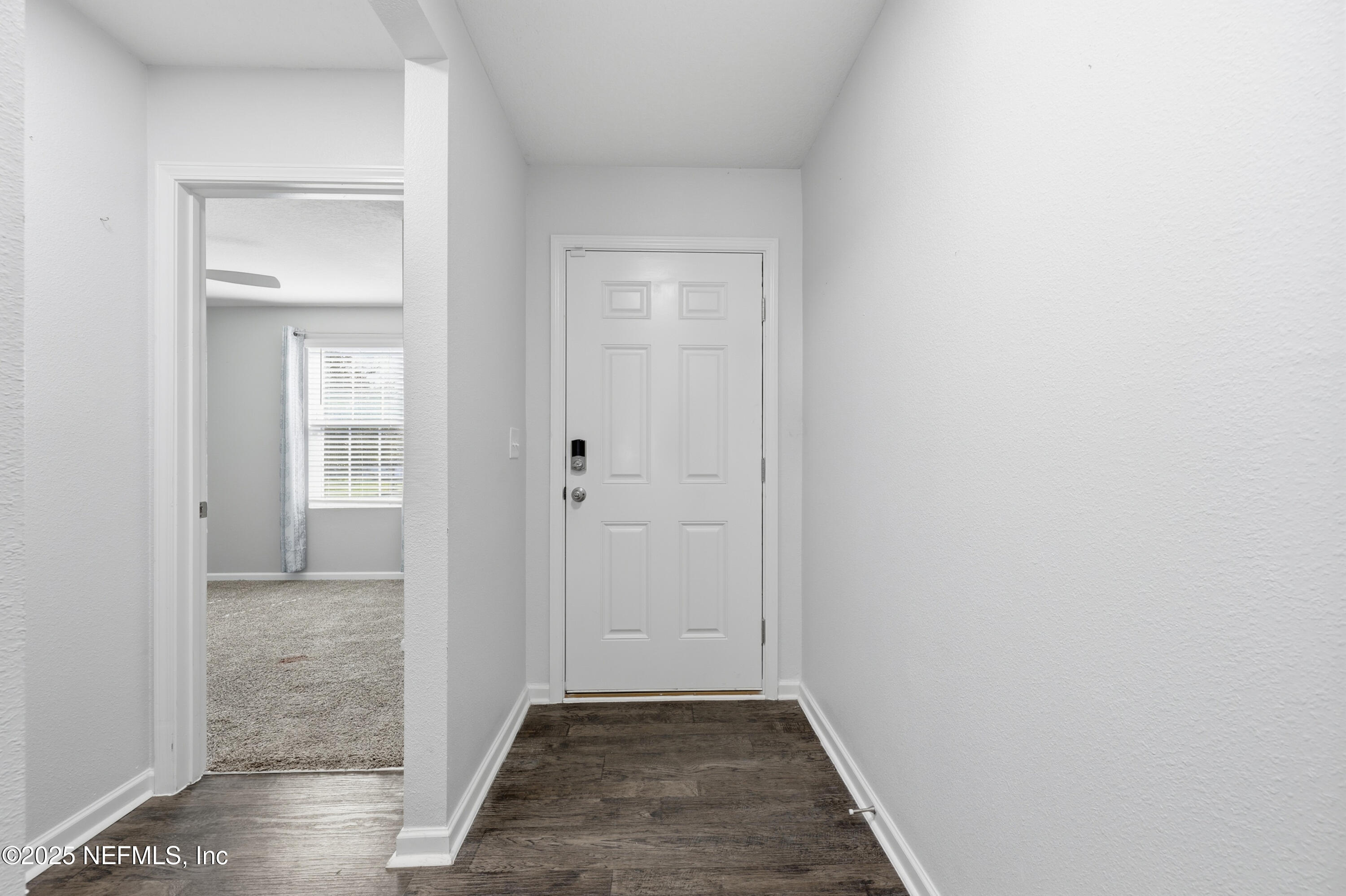 4298 Warm Springs Way Middleburg, FL 32068 - Photo 5 of 36 a view of hallway with wooden floor