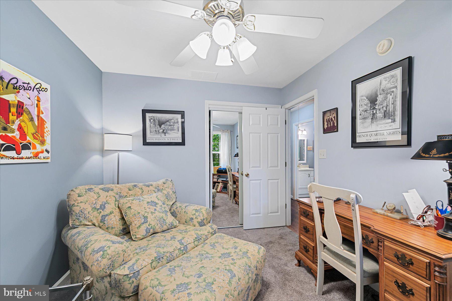 120 Pinehurst Road Berlin, MD 21811 - Photo 17 of 37 a bedroom with a bed and a chandelier