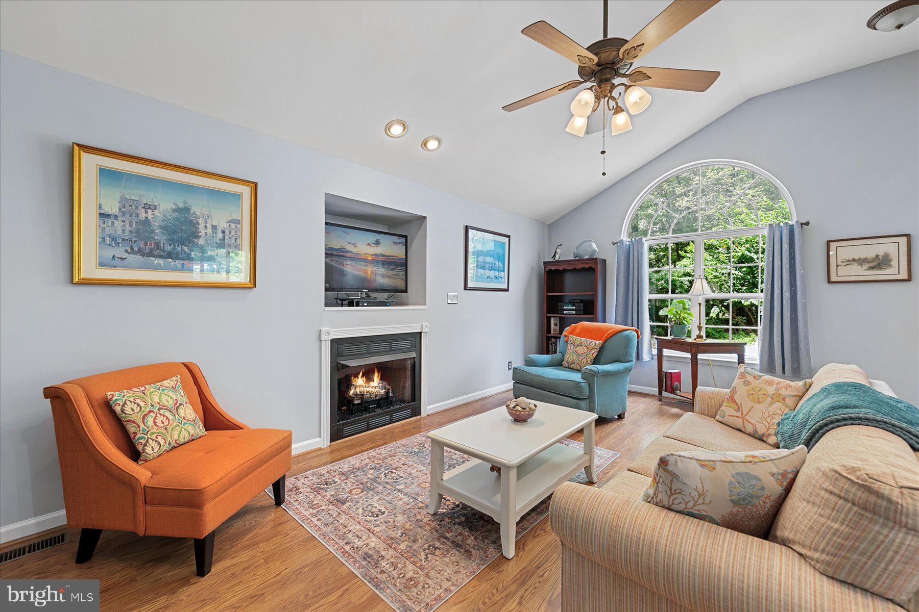120 Pinehurst Road Berlin, MD 21811 - Photo 5 of 37 a living room with furniture fireplace and a large window