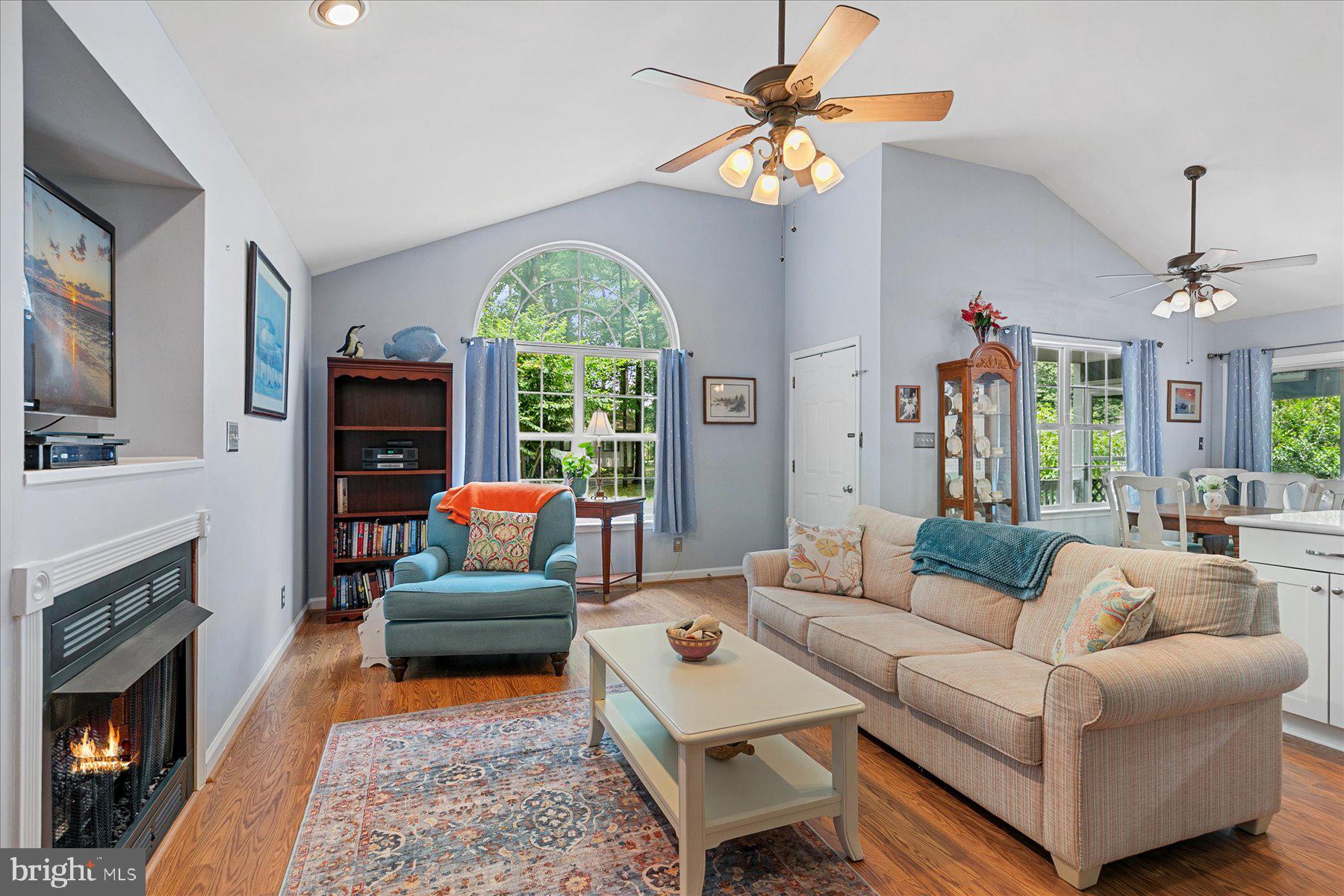 120 Pinehurst Road Berlin, MD 21811 - Photo 6 of 37 a living room with furniture and a fireplace