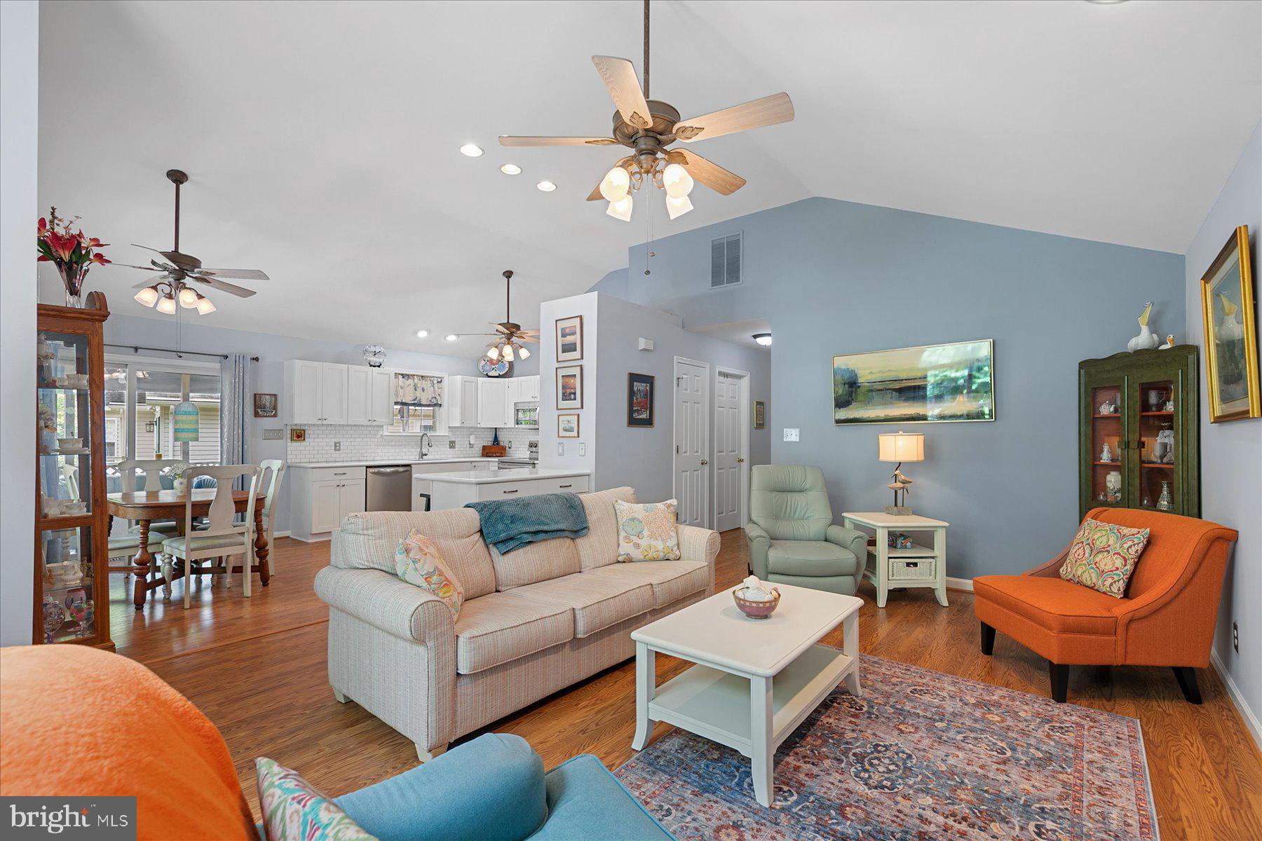 120 Pinehurst Road Berlin, MD 21811 - Photo 7 of 37 a living room with furniture kitchen view and a chandelier