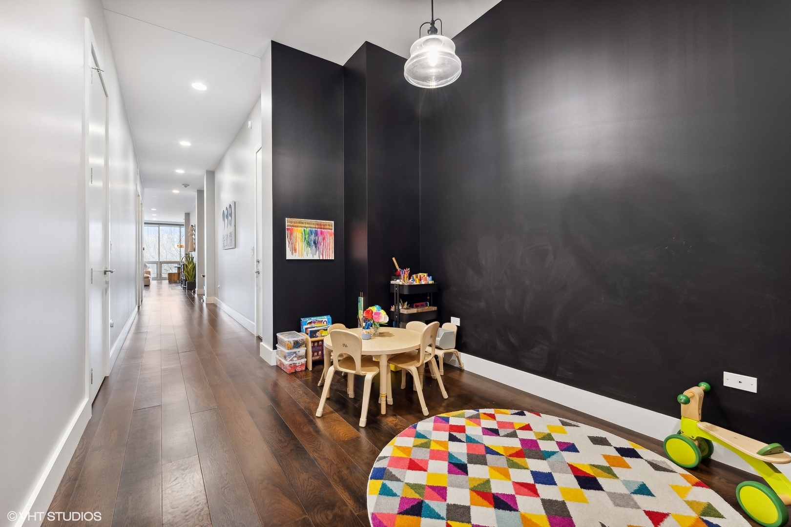 1120 West Adams Street, Unit 3E Chicago, IL 60607 - Photo 16 of 21 a hallway with a dining table chairs and entryway