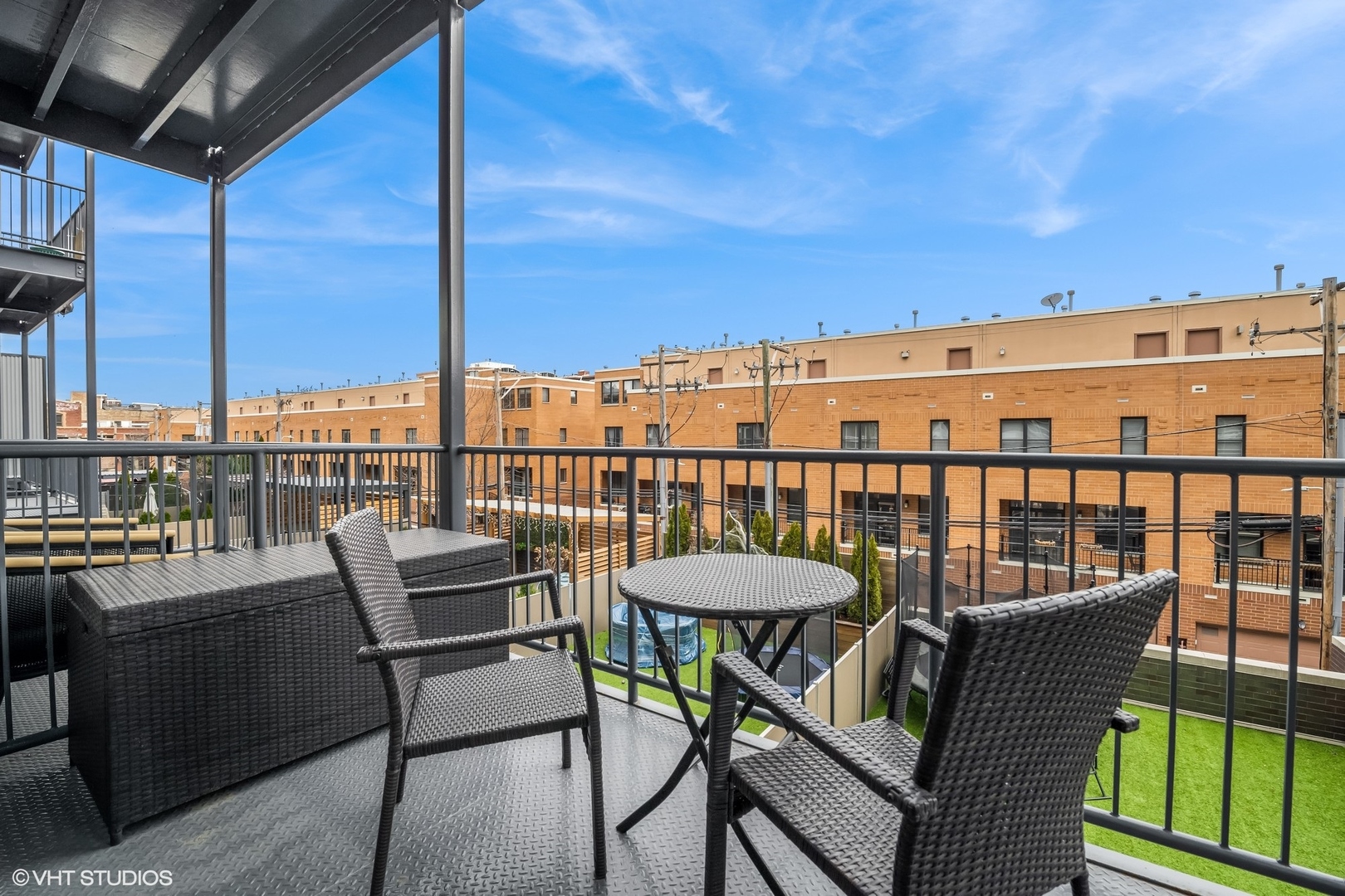 1120 West Adams Street, Unit 3E Chicago, IL 60607 - Photo 19 of 21 a view of a balcony with furniture