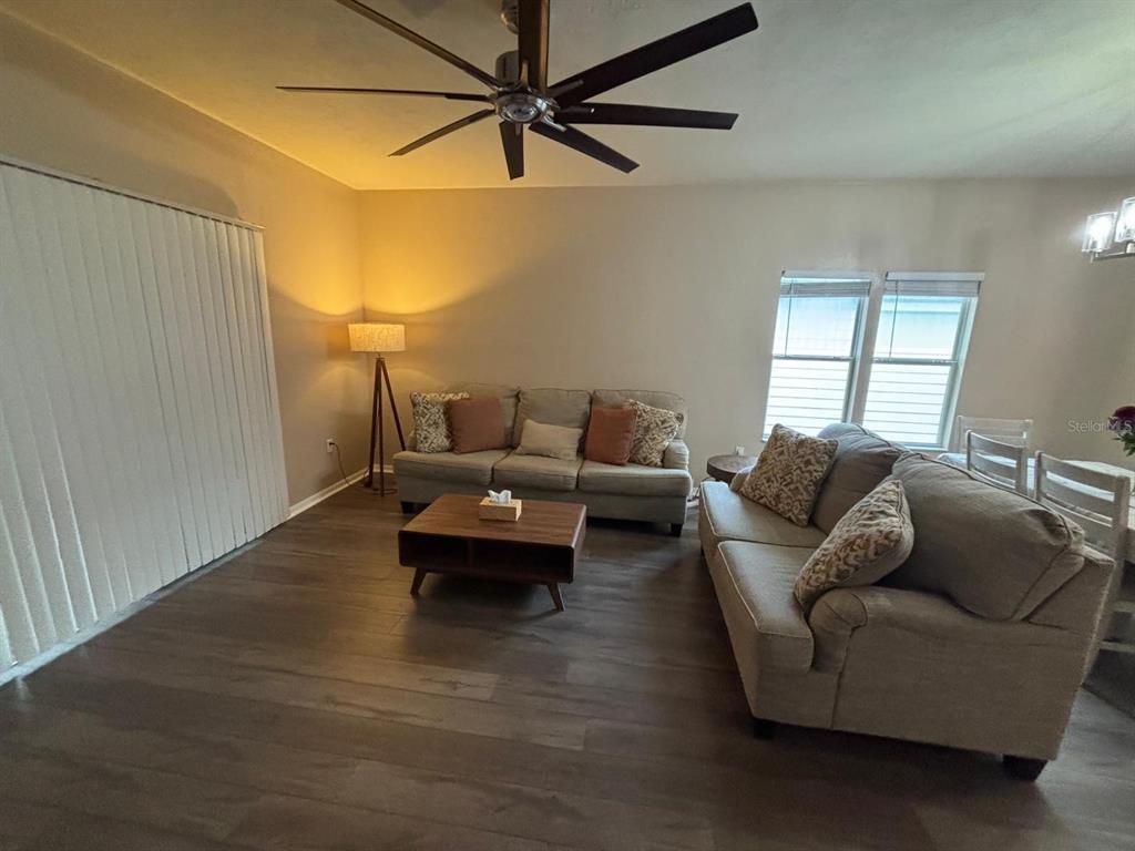 9964 Northwest 22nd Road Gainesville, FL 32606 - Photo 13 of 20 a living room with furniture and a window