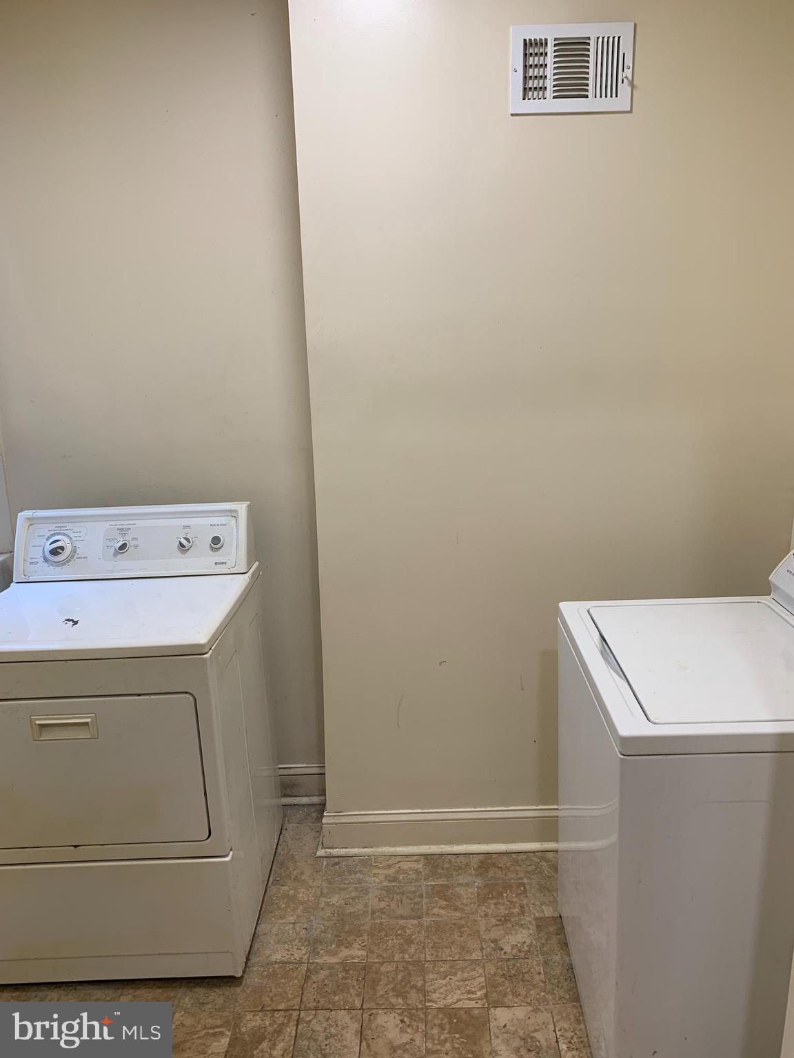 322 North Pulaski Street Baltimore, MD 21223 - Photo 18 of 26 a utility room with dryer and washer