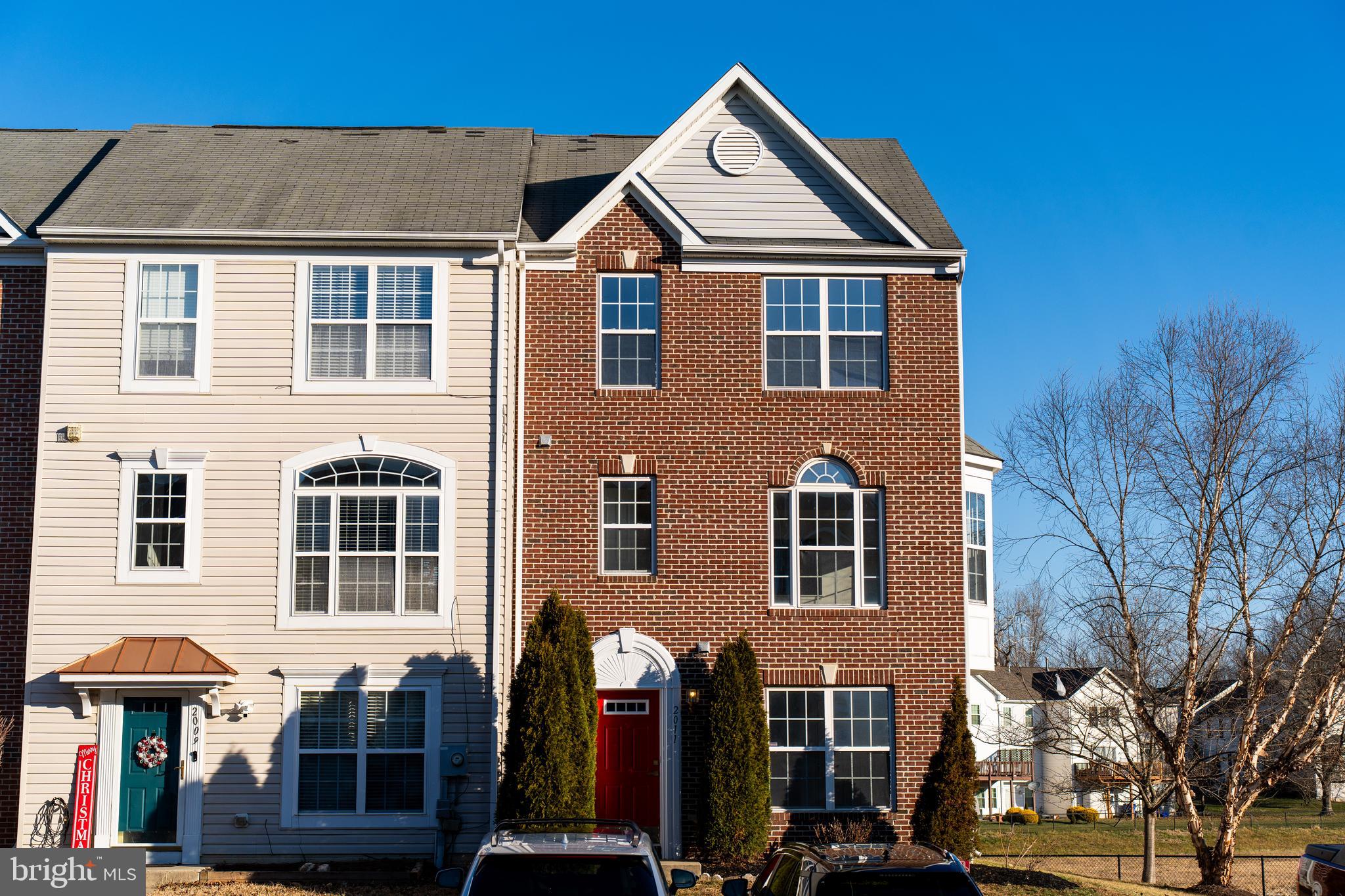 2011 Weitzel Court Frederick, MD 21702 - Photo 1 of 49 a front view of a house with a yard