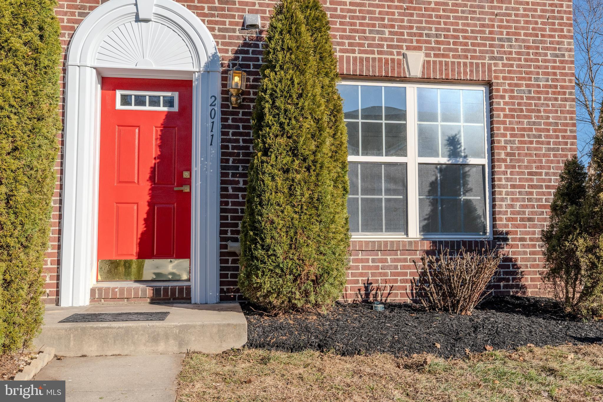 2011 Weitzel Court Frederick, MD 21702 - Photo 31 of 49 a view of a brick house with a small porch