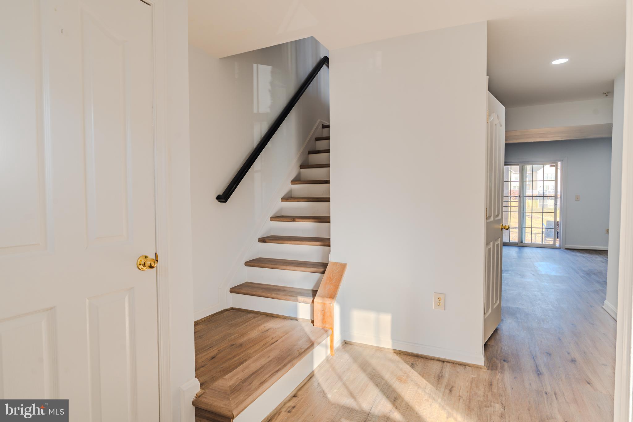 2011 Weitzel Court Frederick, MD 21702 - Photo 39 of 49 a view of entryway and hall with wooden floor