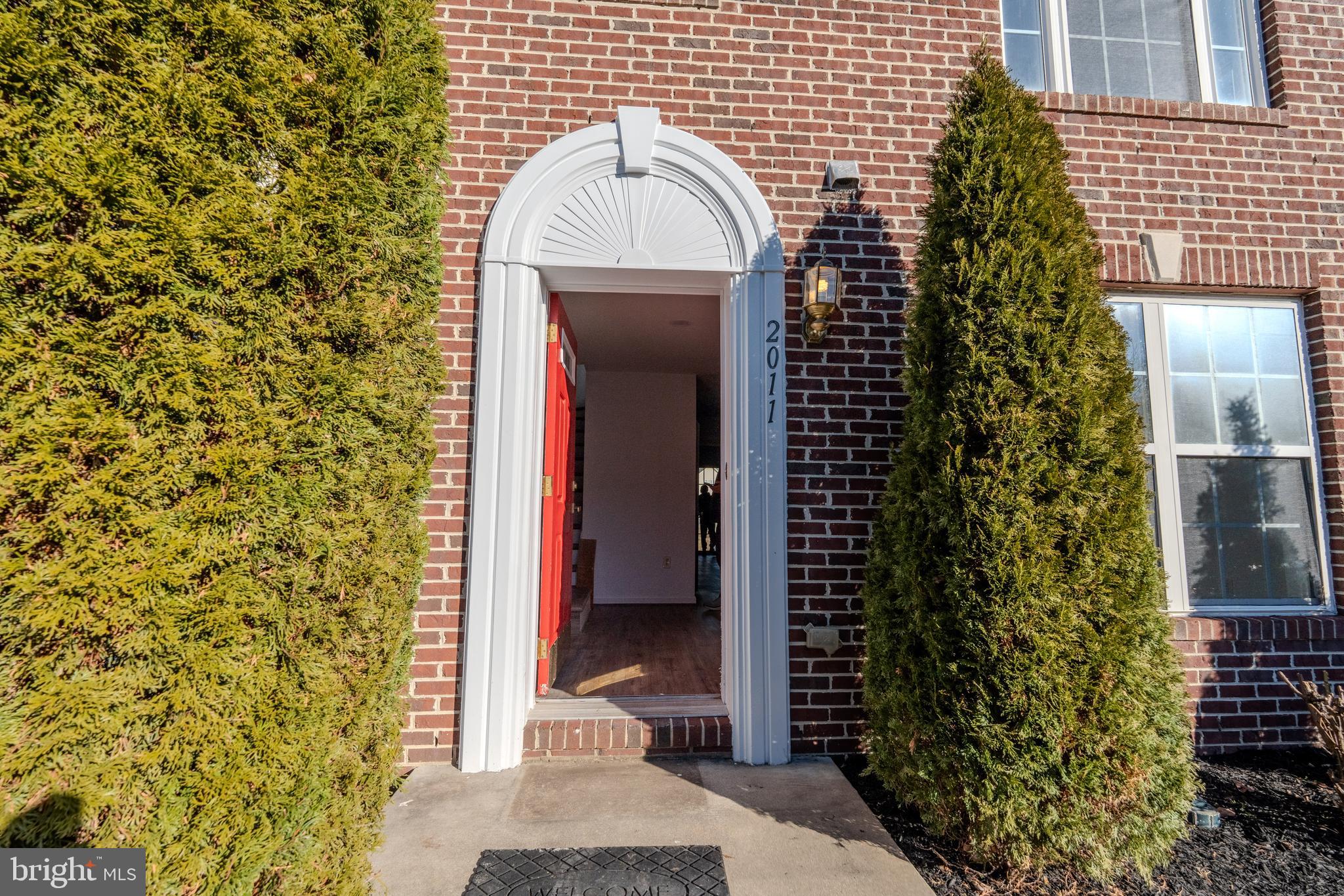 2011 Weitzel Court Frederick, MD 21702 - Photo 4 of 49 a view of a bathroom with a shower curtain