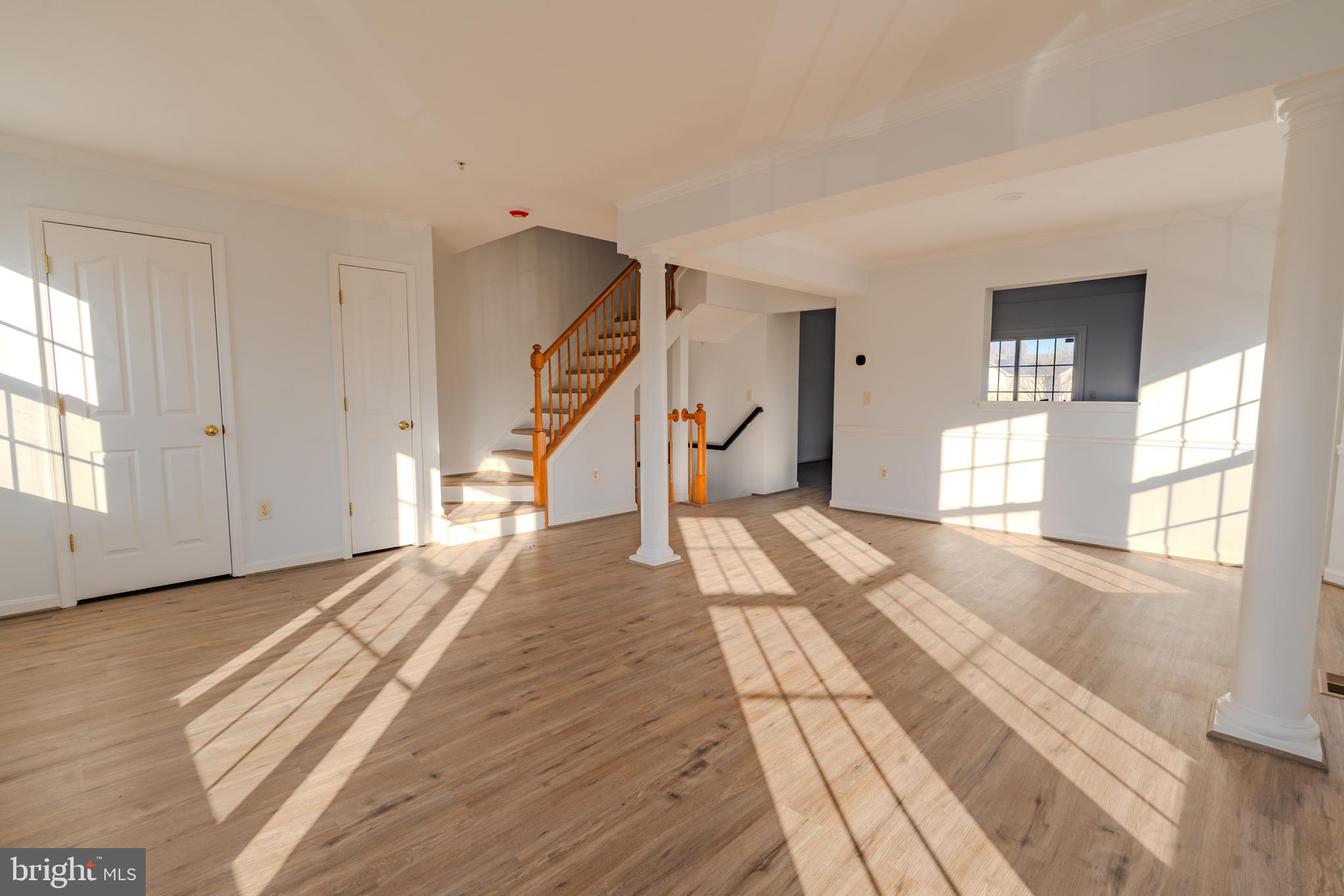 2011 Weitzel Court Frederick, MD 21702 - Photo 48 of 49 a view of empty room with wooden floor and fan