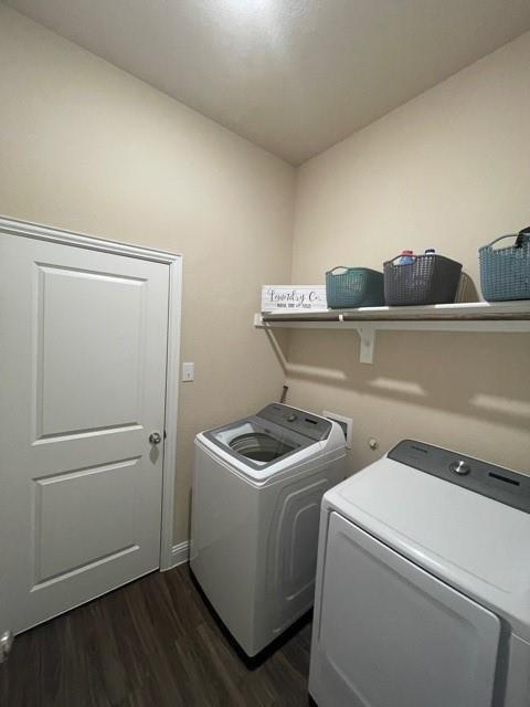 569 Spruce Trail Forney, TX 75126 - Photo 4 of 22 Laundry room featuring dark wood-style flooring and separate washer and dryer