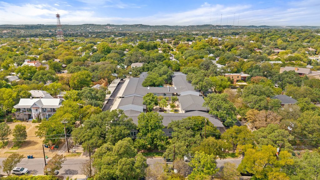 1210 Windsor Road, Unit 209 Austin, TX 78703 - Photo 37 of 38 This second-level condo is tucked within the one-of-a-kind Windsor Oaks community.