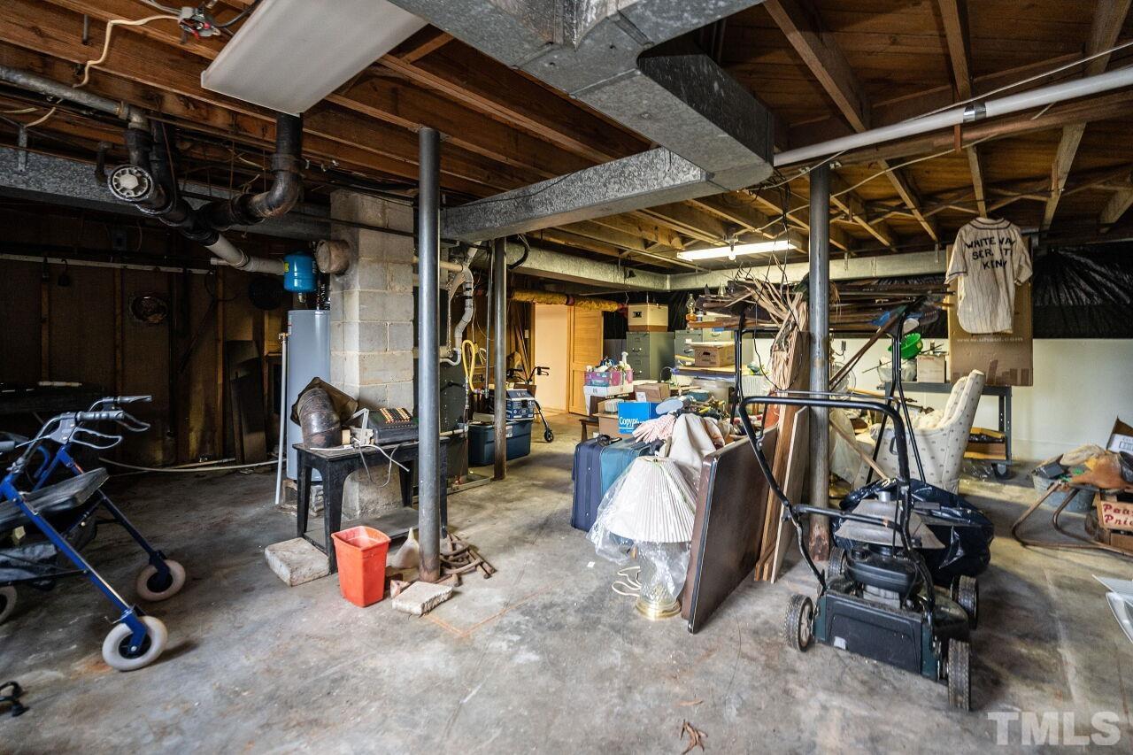 211 Quail Drive Raleigh, NC 27604 - Photo 26 of 28 a view of a room with gym equipment