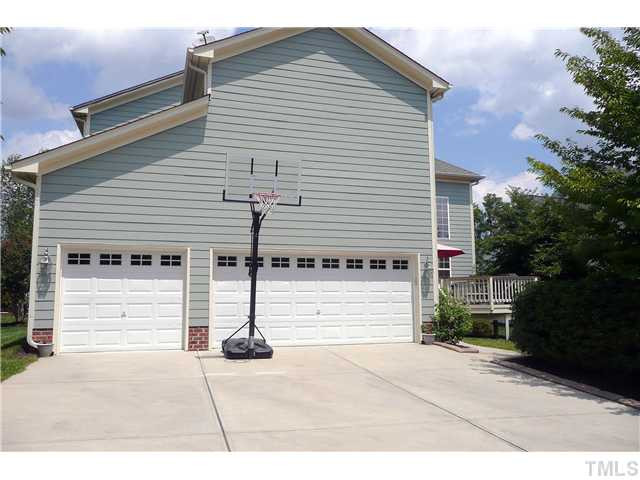 10504 Swerling Way Raleigh, NC 27614 - Photo 25 of 25 This home has a three car, rear-entry garage. Parking Lot/Garage