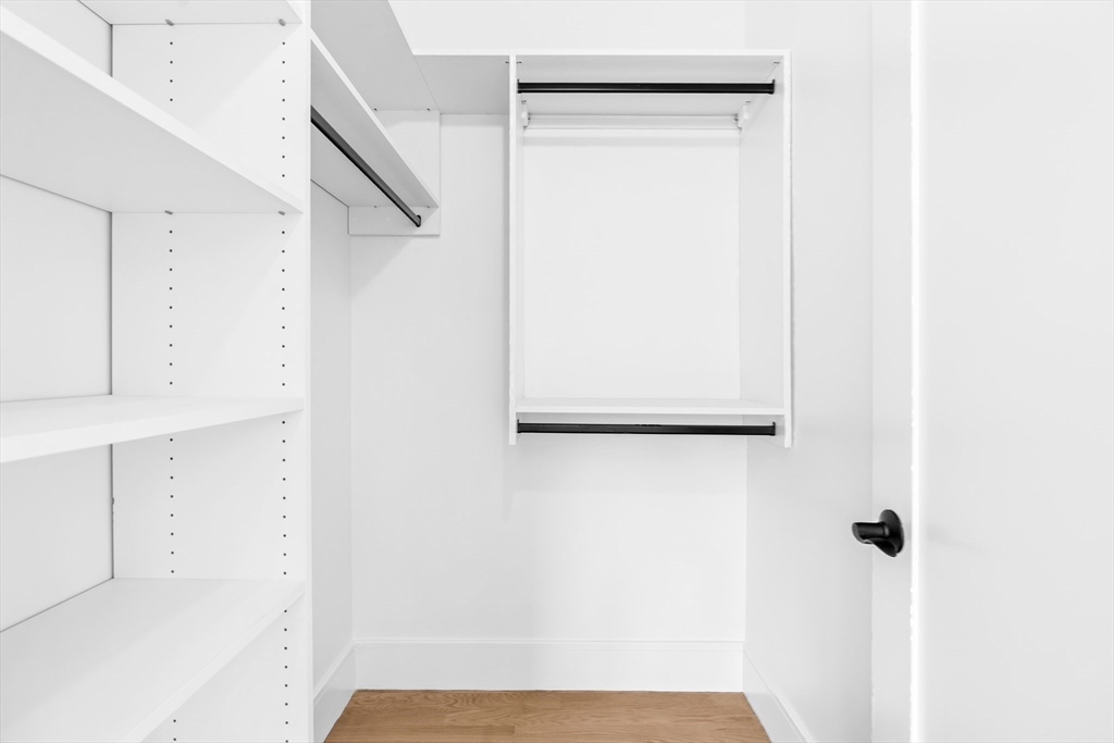 143 Tremont Street, Unit A Boston, MA 02135 - Photo 15 of 28 a view of walk in closet with white walls