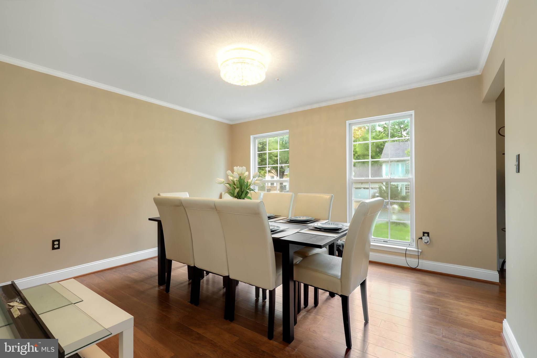 9211 Sandy Creek Road Fort Washington, MD 20744 - Photo 20 of 30 a view of a dining room with furniture and wooden floor