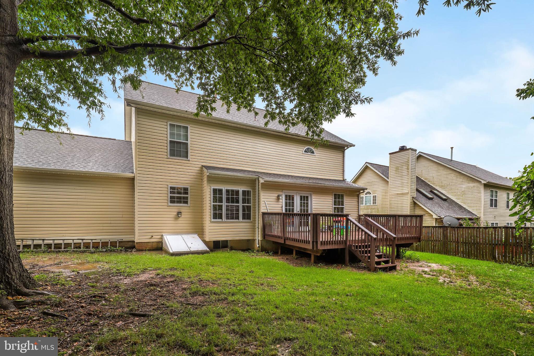 9211 Sandy Creek Road Fort Washington, MD 20744 - Photo 29 of 30 a view of a house with a backyard