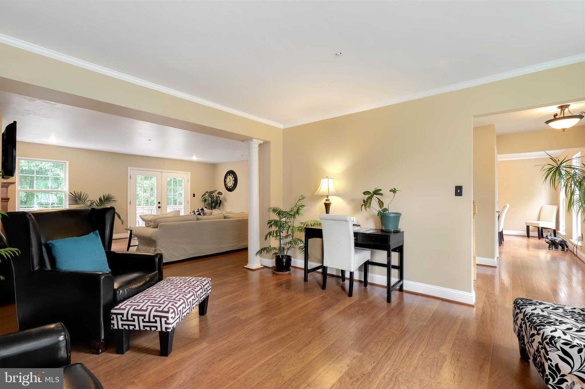 9211 Sandy Creek Road Fort Washington, MD 20744 - Photo 6 of 30 a living room with furniture and a wooden floor