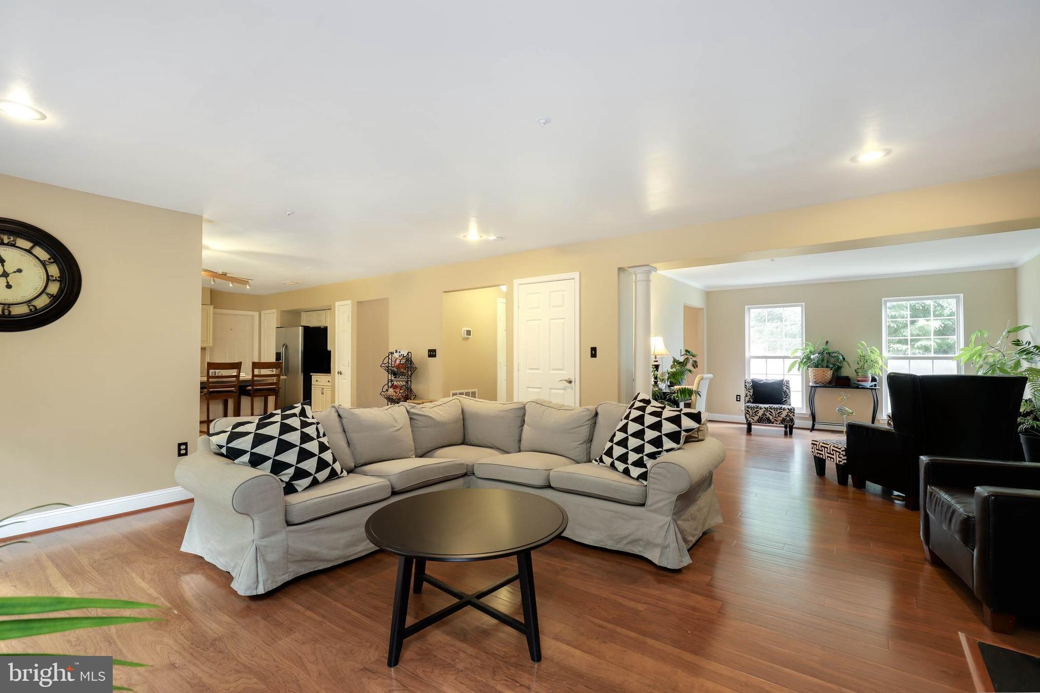 9211 Sandy Creek Road Fort Washington, MD 20744 - Photo 7 of 30 a living room with furniture and a couch