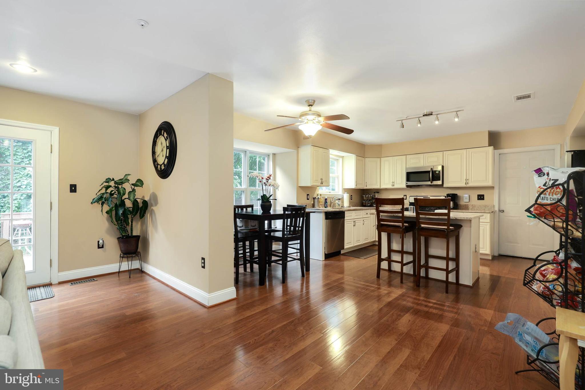 9211 Sandy Creek Road Fort Washington, MD 20744 - Photo 10 of 30 a view of kitchen with furniture and wooden floor