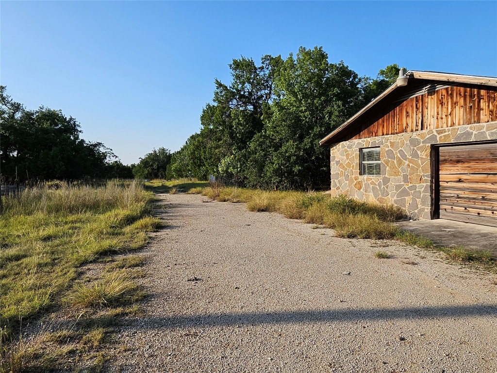 2217 Downing Lane Leander, TX 78641 - Photo 13 of 18 a view of a house with a yard