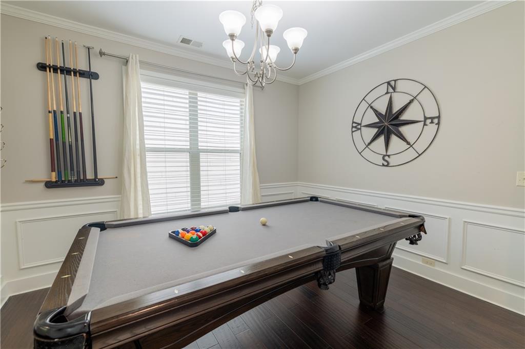 1567 Maplecliff Way Sugar Hill, GA 30518 - Photo 13 of 31 a room with pool table and windows