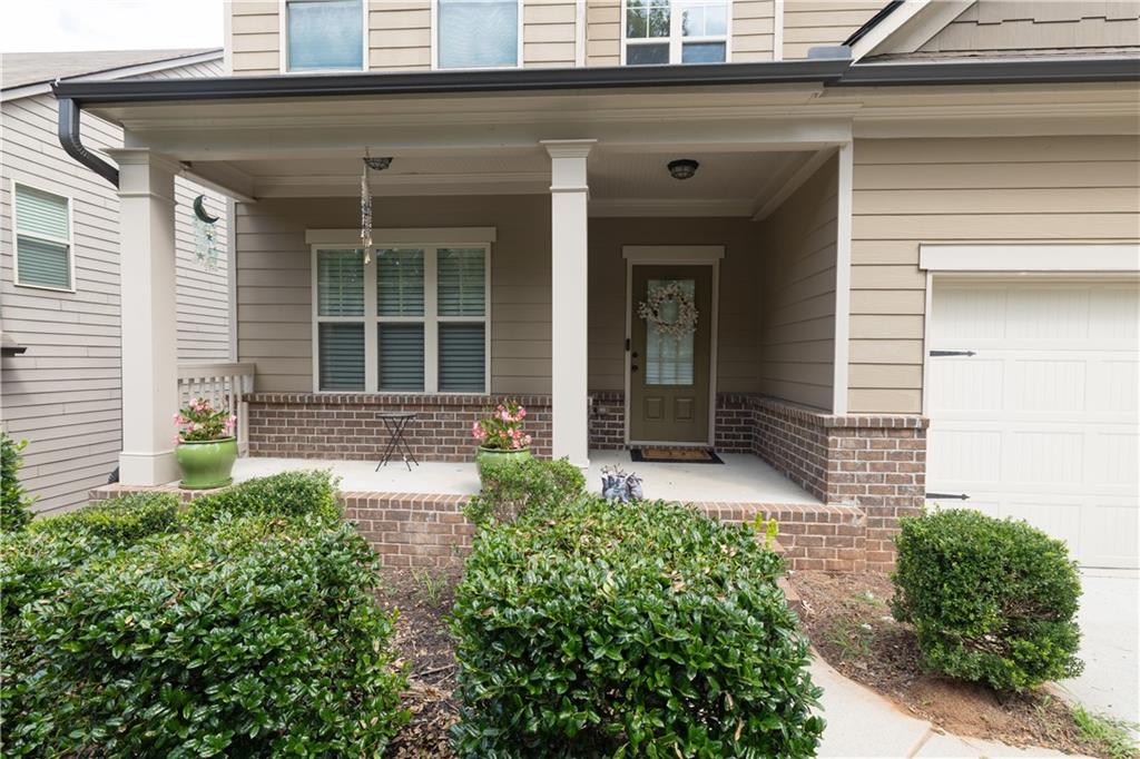 1567 Maplecliff Way Sugar Hill, GA 30518 - Photo 7 of 31 front view of a house