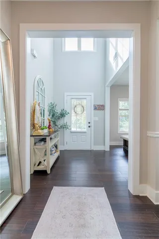 wooden floor with a window in a room