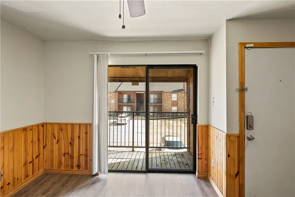a front view of a house with a yard and a garage