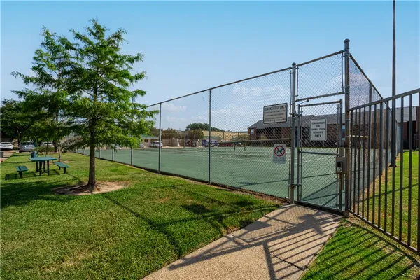 a view of a backyard with a garden