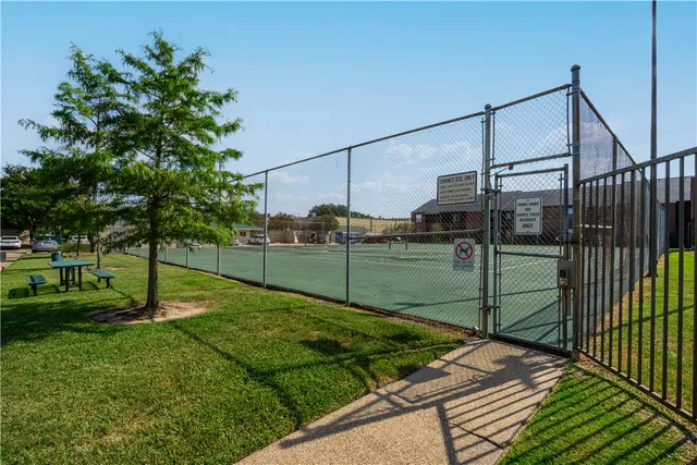 a view of a backyard with a garden