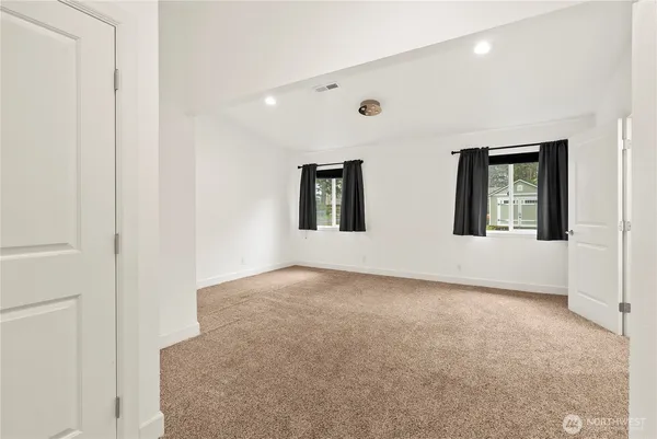 an empty room with windows