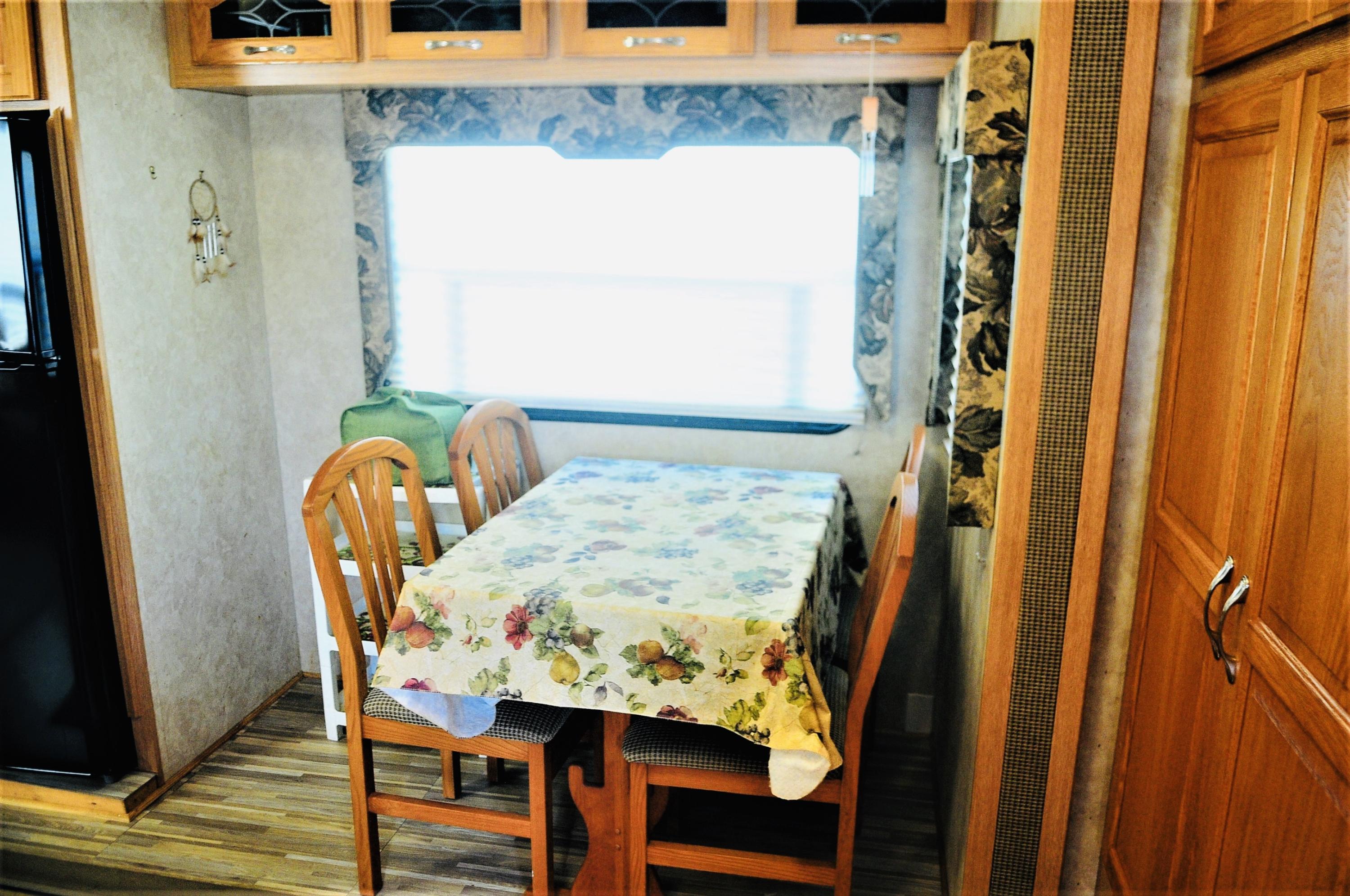 55 Boca Chica Road, Unit 461 Key West, FL 33040 - Photo 13 of 37 a dining room with furniture and window